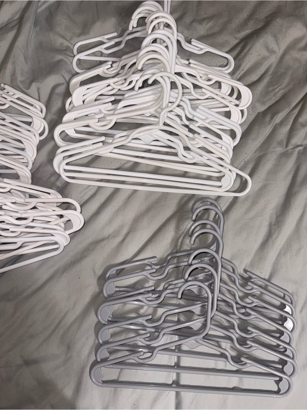 Set of White and Gray Plastic Kid Clothing Hangers 51 white & 7 gray